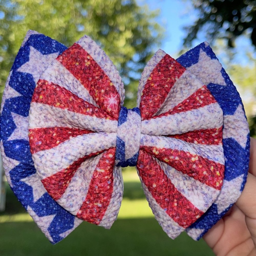 Handmade red white and blue sparkly layered bow